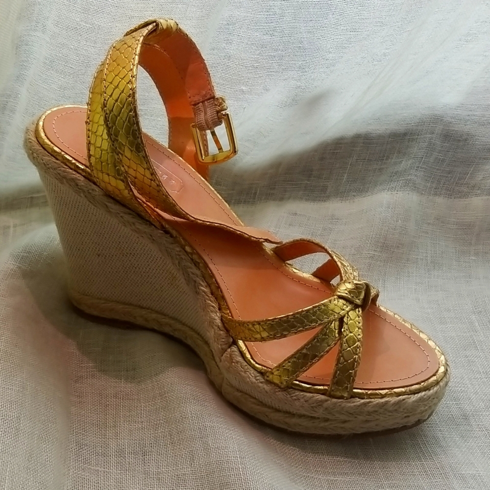These shoes are coach helen met gold python sandal in size 5